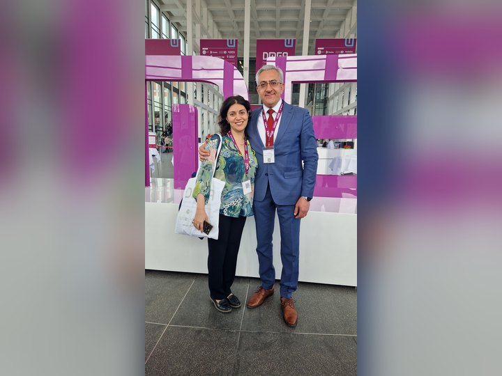 Prof. Georgi Chaltikyan with a DMEA 2023 participant in front of the DMEA letters