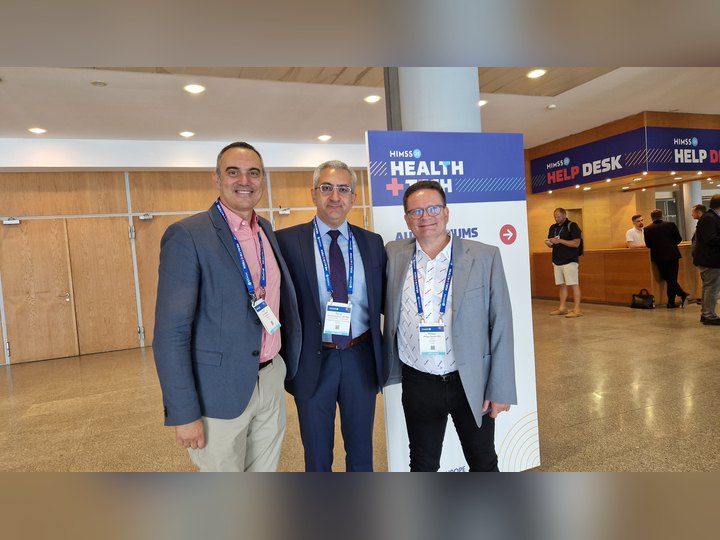 Prof. Georgi Chaltikyan during networking at HIMSS Europe 2023