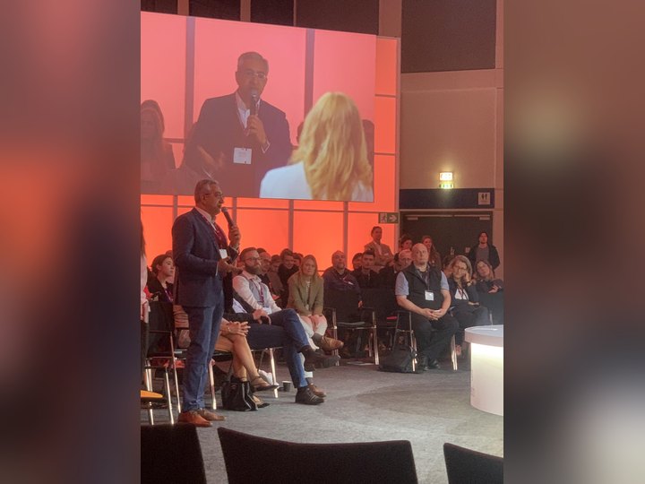 Prof. Georgi Chaltikyan speaking during an audience discussion at DMEA 2024