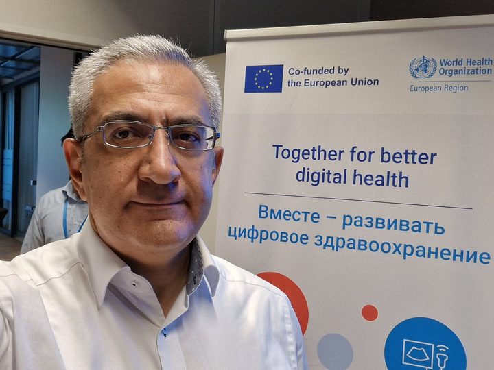 Prof. Georgi Chaltikyan participating with colleagues and attendees during WHO Digital Health Workshop
