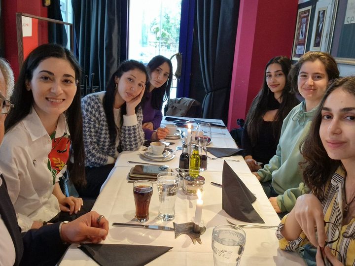 Prof. Georgi Chaltikyan with Digital Health students during an evening gathering