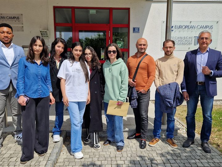Prof. Georgi Chaltikyan with international workshop participants outside ECRI