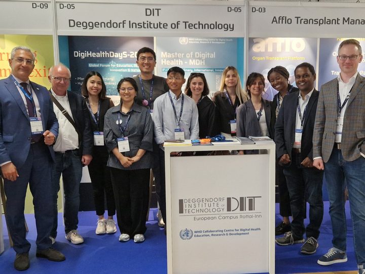 Prof. Georgi Chaltikyan and the DIT-ECRI team at their HIMSS Europe booth