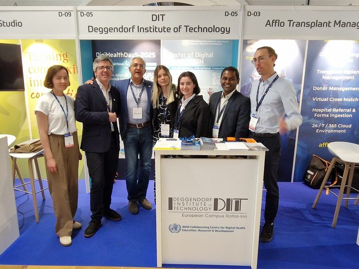 Prof. Georgi Chaltikyan with international partners at the DIT-ECRI exhibition booth