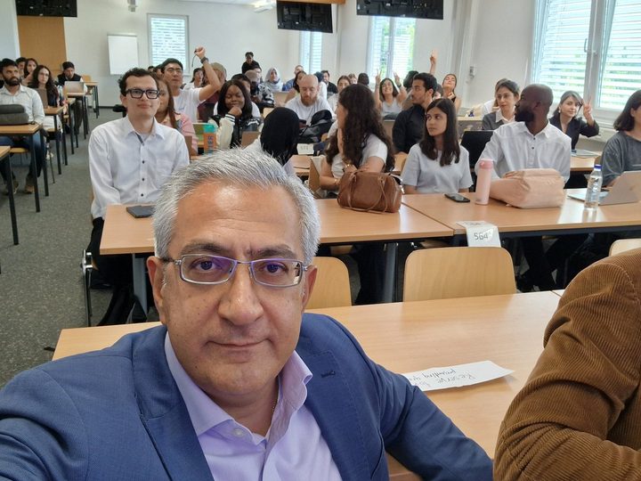 Prof. Georgi Chaltikyan taking a classroom selfie with Digital Health students