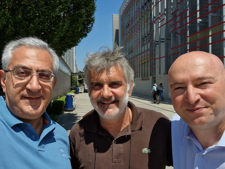 Prof. Georgi Chaltikyan taking an outdoor selfie with colleagues in Milan