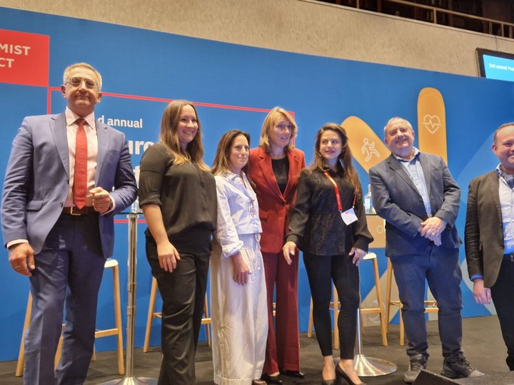 Prof. Georgi Chaltikyan with speakers on the Future of Health Europe stage