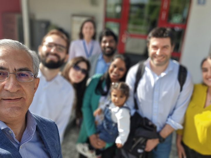 Prof. Georgi Chaltikyan taking a group selfie with visiting participants