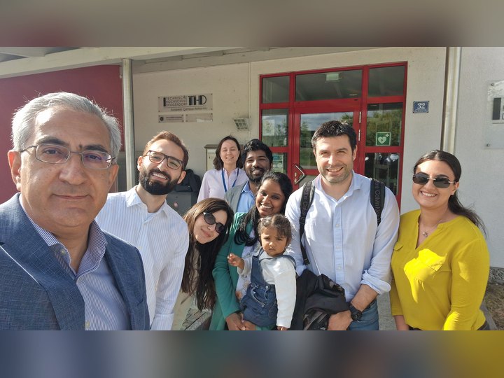 Prof. Georgi Chaltikyan taking a group selfie with visiting participants during Interoperability Week 2026