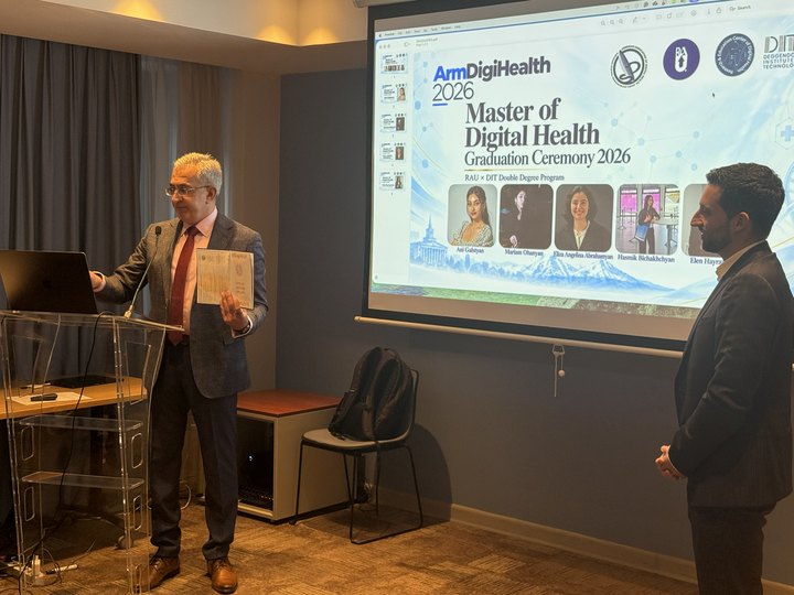 Prof. Georgi Chaltikyan presenting the Master of Digital Health graduation certificates